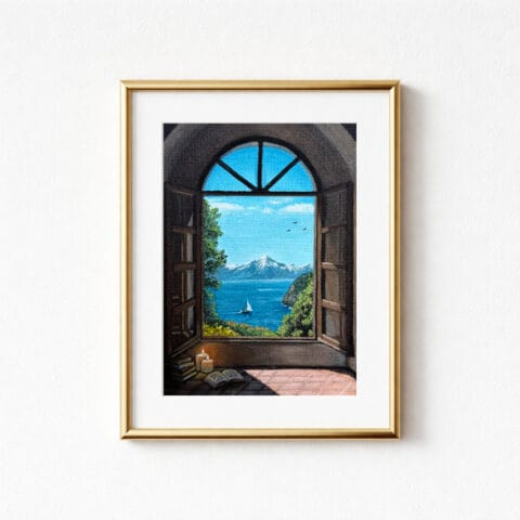 A framed print showing a view through an arched window. The artwork features a sailboat on a blue sea, mountains, and a clear sky with a few birds flying in the distance. The windows are open towards the viewer, and two candles, a pile of books and an open book are on the tiled floor beneath.